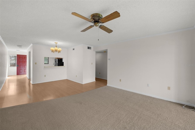 2679 Sabal Springs Cir Unit 203, Clearwater, FL 33761 - carpeted empty room with crown molding and a textured ceiling
