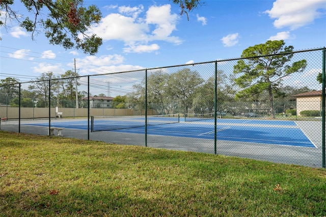 2679 Sabal Springs Cir Unit 203, Clearwater, FL 33761 - view of tennis court with a yard