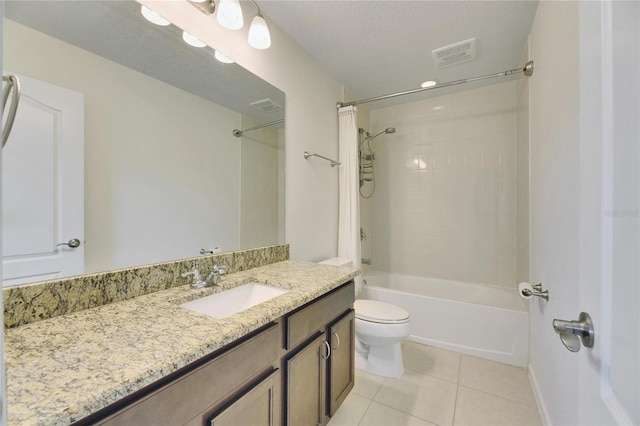 full bathroom with shower / bathtub combination with curtain, tile patterned flooring, toilet, vanity, and a textured ceiling