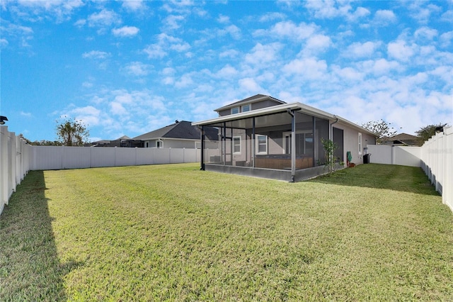 view of yard featuring a sunroom