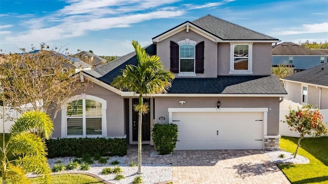 view of front of home featuring a garage