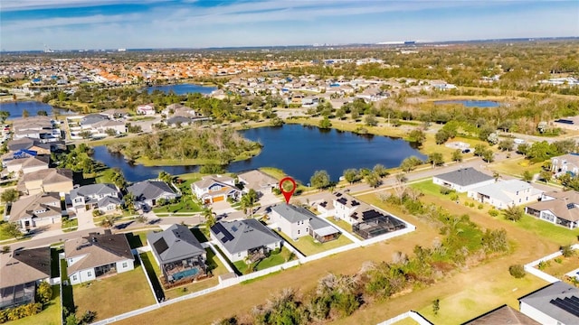 drone / aerial view featuring a water view