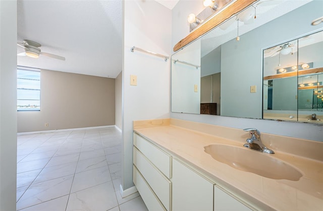 bathroom featuring vanity and ceiling fan