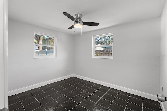 unfurnished room featuring ceiling fan