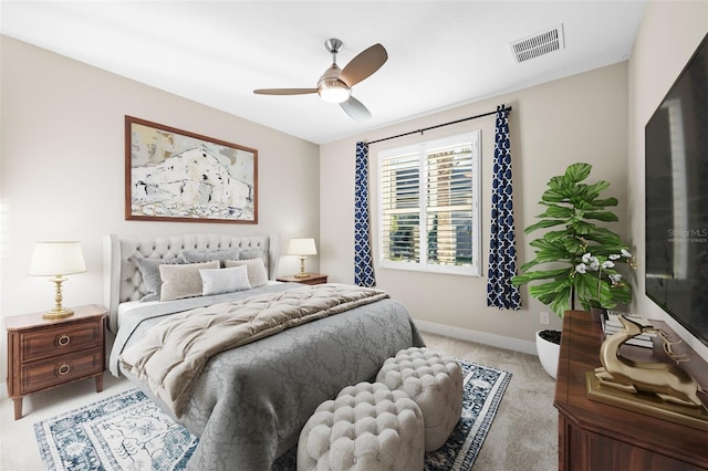 bedroom featuring ceiling fan and light colored carpet