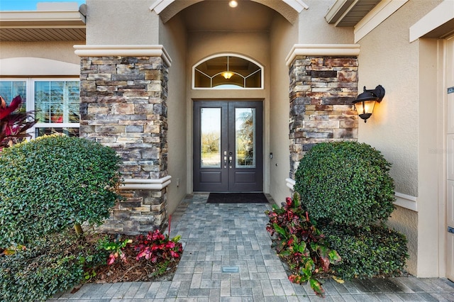 doorway to property featuring french doors