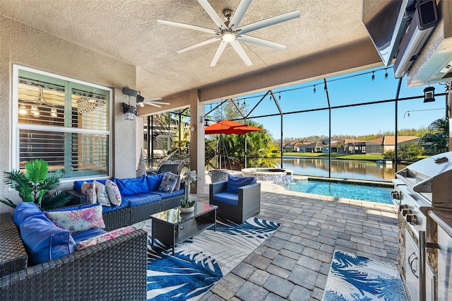 view of patio / terrace featuring a pool with hot tub, glass enclosure, ceiling fan, an outdoor living space, and a water view