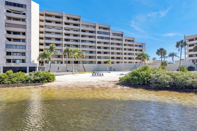 view of building exterior with a water view