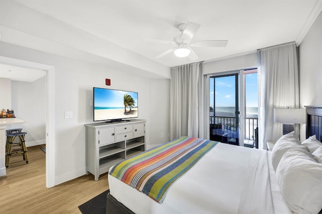 bedroom featuring access to outside, ceiling fan, and light hardwood / wood-style floors