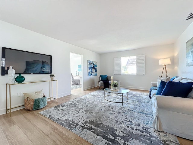 living room with hardwood / wood-style floors