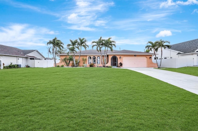 ranch-style home with a front yard and a garage