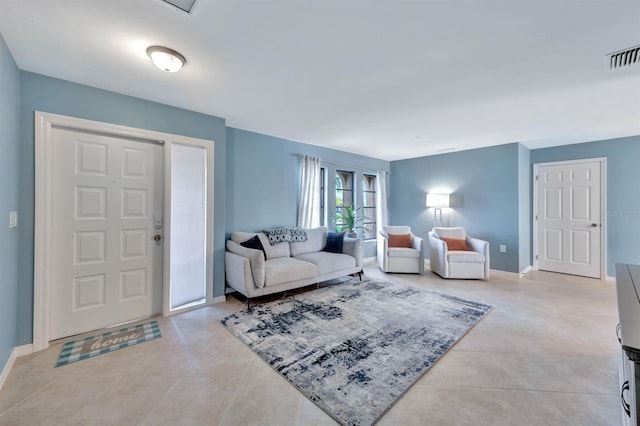 living room with light tile patterned floors