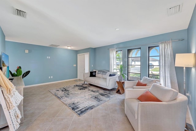 living room with light tile patterned floors