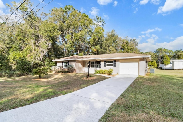 single story home featuring a front yard and a garage