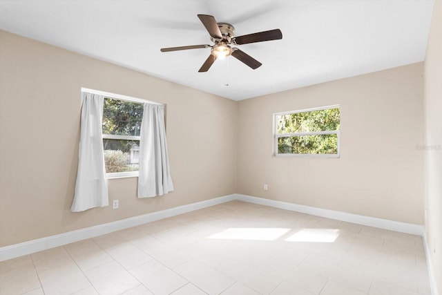 spare room featuring ceiling fan