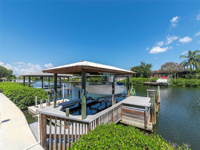 view of dock with a water view