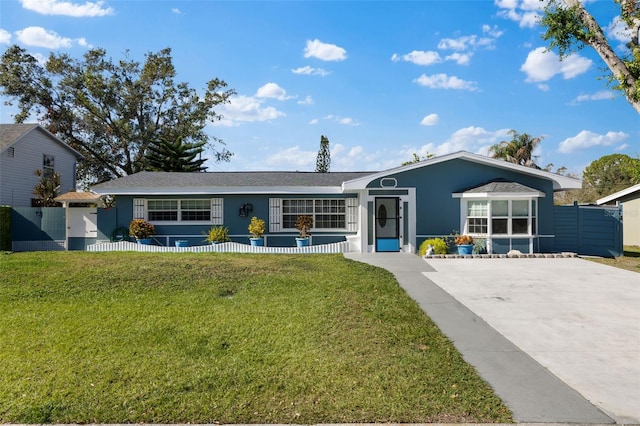 ranch-style house with a front lawn