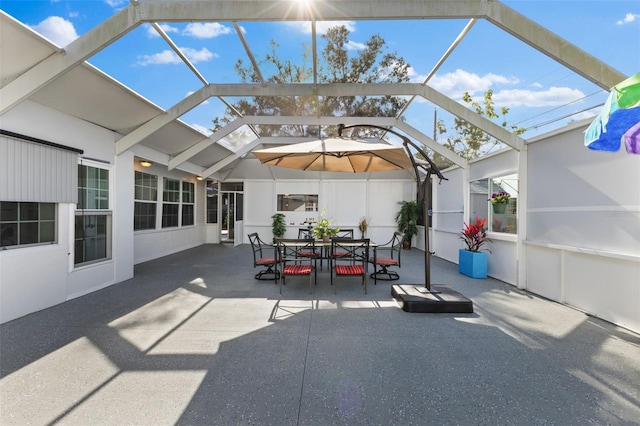 sunroom / solarium featuring lofted ceiling