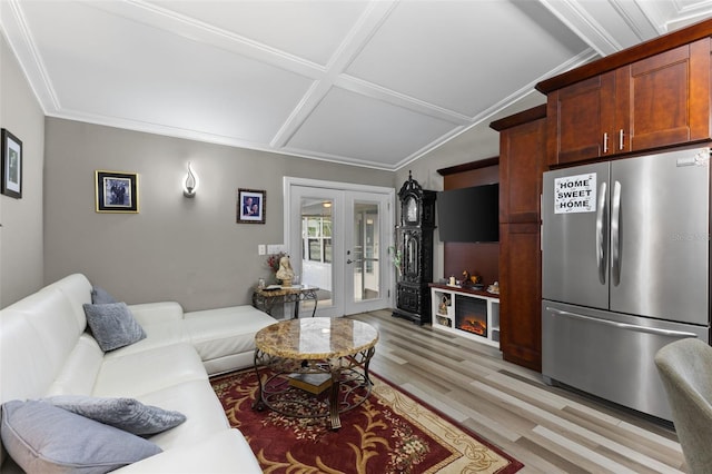 living room with coffered ceiling, light hardwood / wood-style floors, crown molding, and french doors