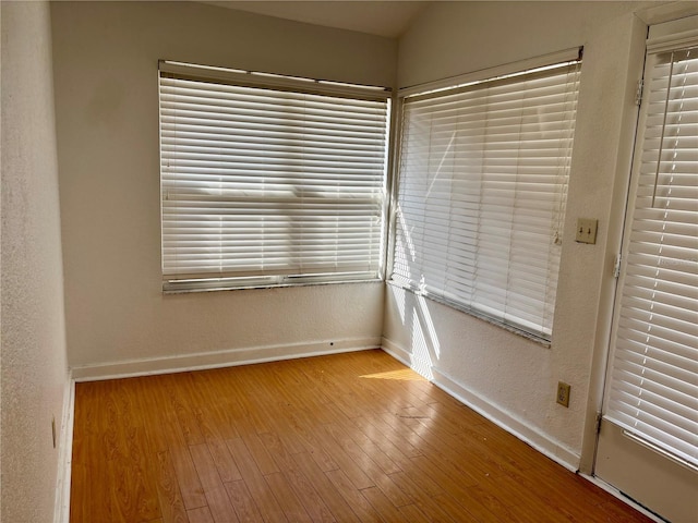 empty room featuring light hardwood / wood-style floors