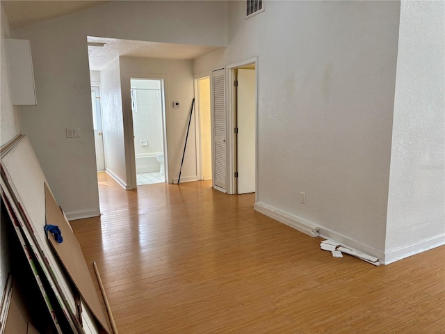 unfurnished room featuring light hardwood / wood-style floors