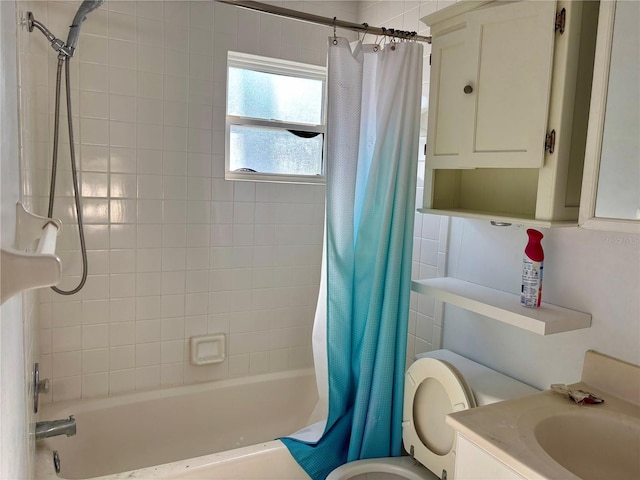 full bathroom with vanity, toilet, and shower / bath combo with shower curtain