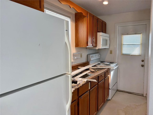 kitchen featuring white appliances