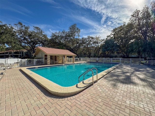 view of pool featuring a patio area