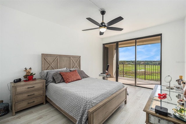 bedroom with access to exterior, ceiling fan, and light hardwood / wood-style floors