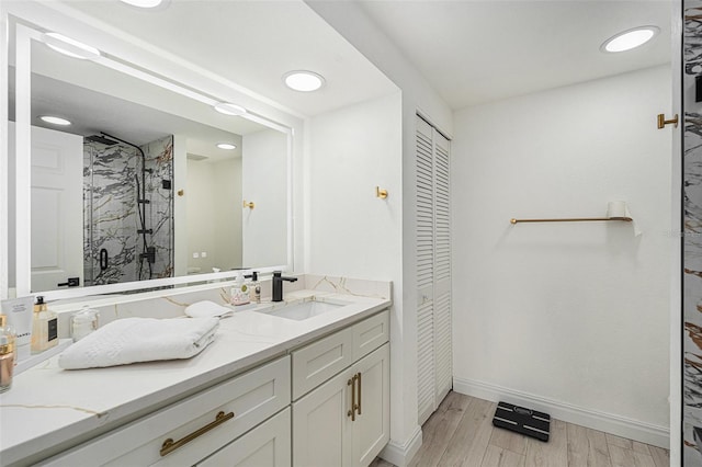 bathroom featuring vanity and walk in shower