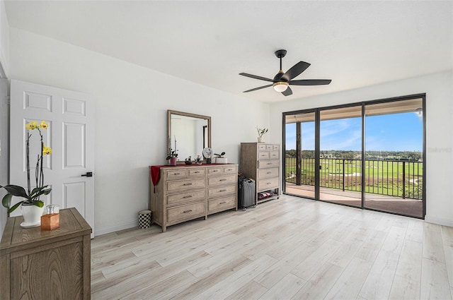 bedroom with ceiling fan, light hardwood / wood-style floors, and access to outside