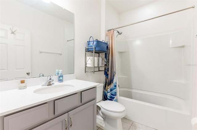 full bathroom featuring tile patterned flooring, vanity, toilet, and shower / bath combo with shower curtain