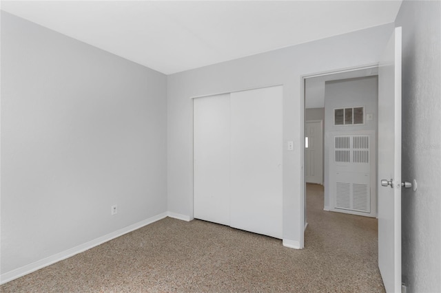 unfurnished bedroom featuring a closet