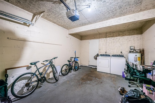 garage with separate washer and dryer, a garage door opener, and water heater