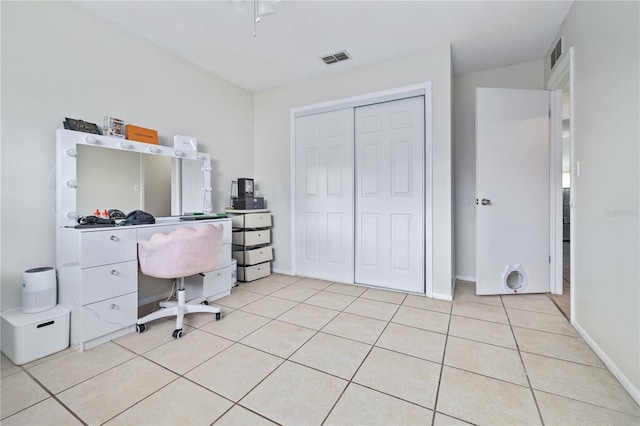 office with light tile patterned floors