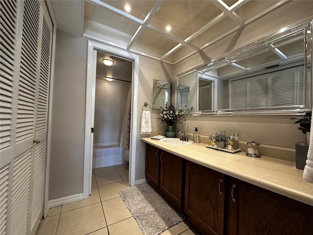 bathroom with tile patterned flooring, vanity, and shower / tub combo