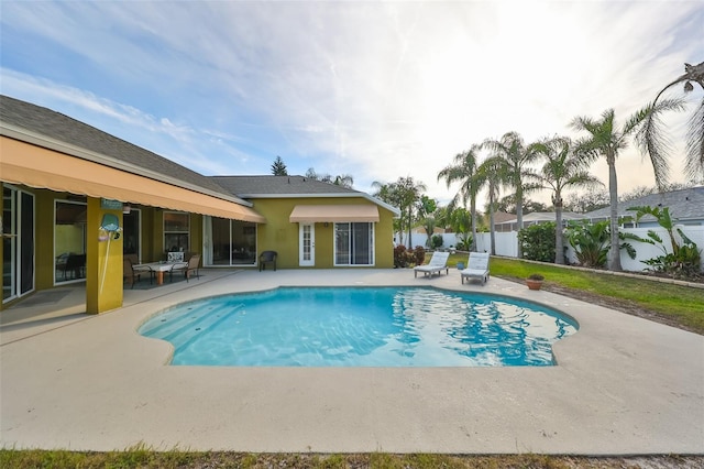 view of pool featuring a patio