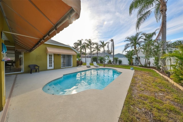 view of pool with a patio area