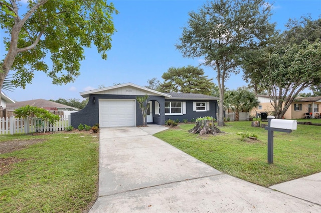 ranch-style home with a front yard, driveway, an attached garage, and fence