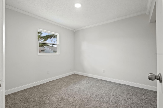 carpeted empty room featuring baseboards, a textured ceiling, and ornamental molding