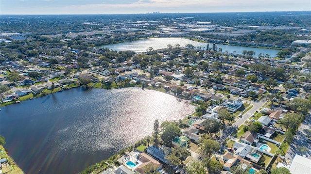 drone / aerial view with a water view