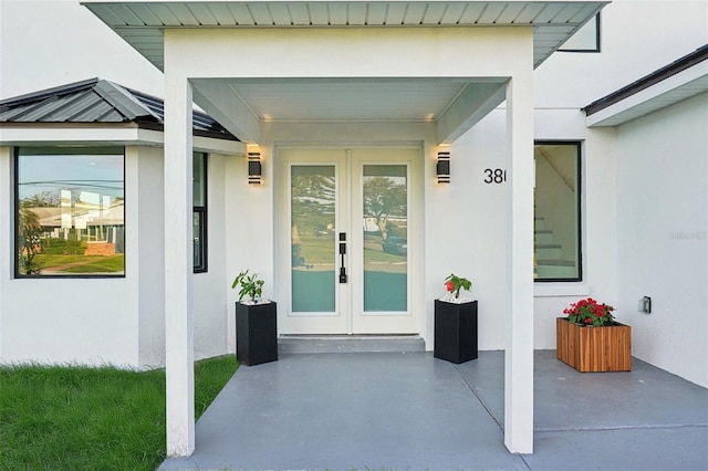 doorway to property featuring a patio area and french doors