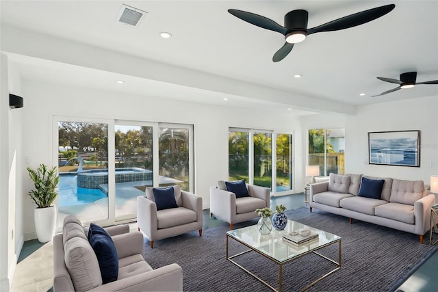 living room featuring ceiling fan