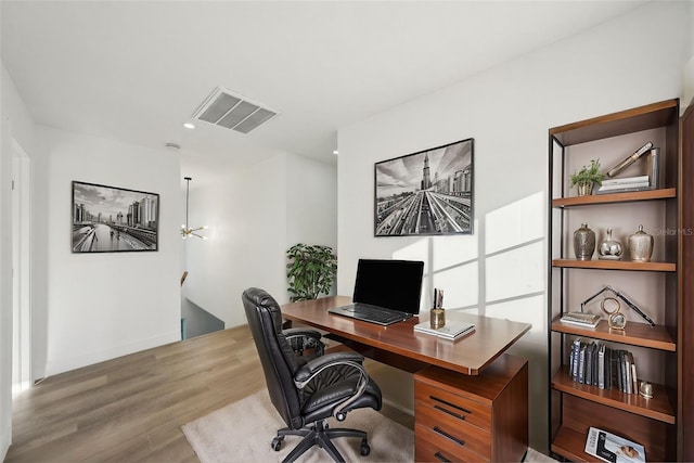 office featuring hardwood / wood-style flooring