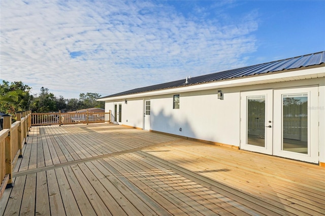 wooden deck with french doors