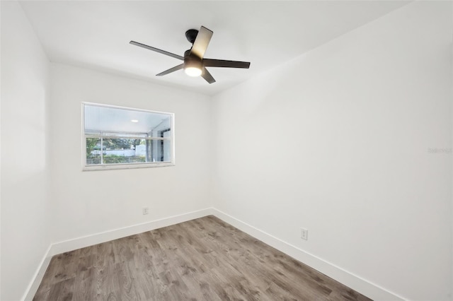 empty room with light hardwood / wood-style flooring and ceiling fan