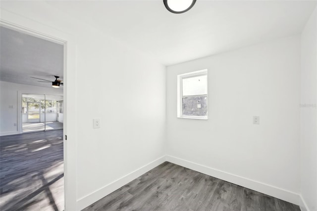 unfurnished room featuring ceiling fan and hardwood / wood-style floors