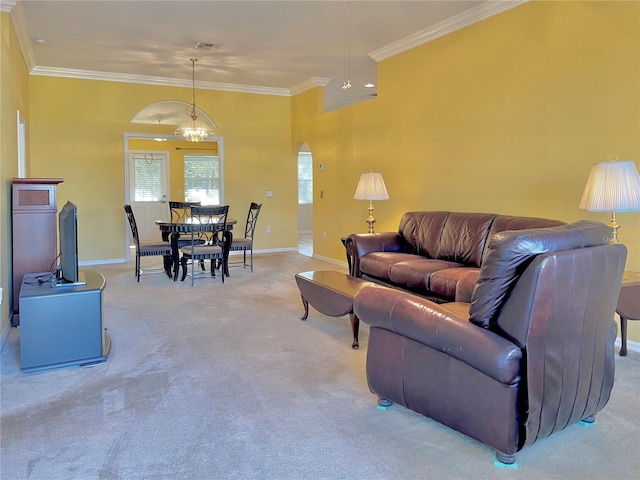 living room featuring crown molding and light colored carpet