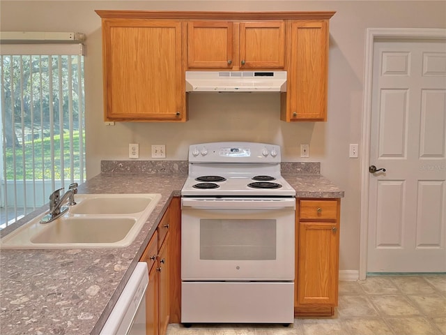 kitchen with white appliances and sink