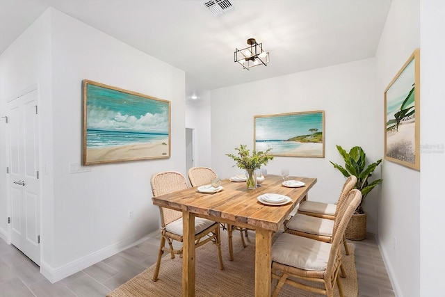 dining area with a chandelier